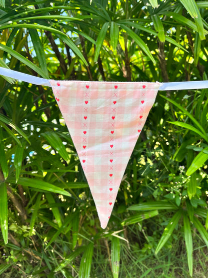 Close up of pink gingham bunting flag from Sterck.