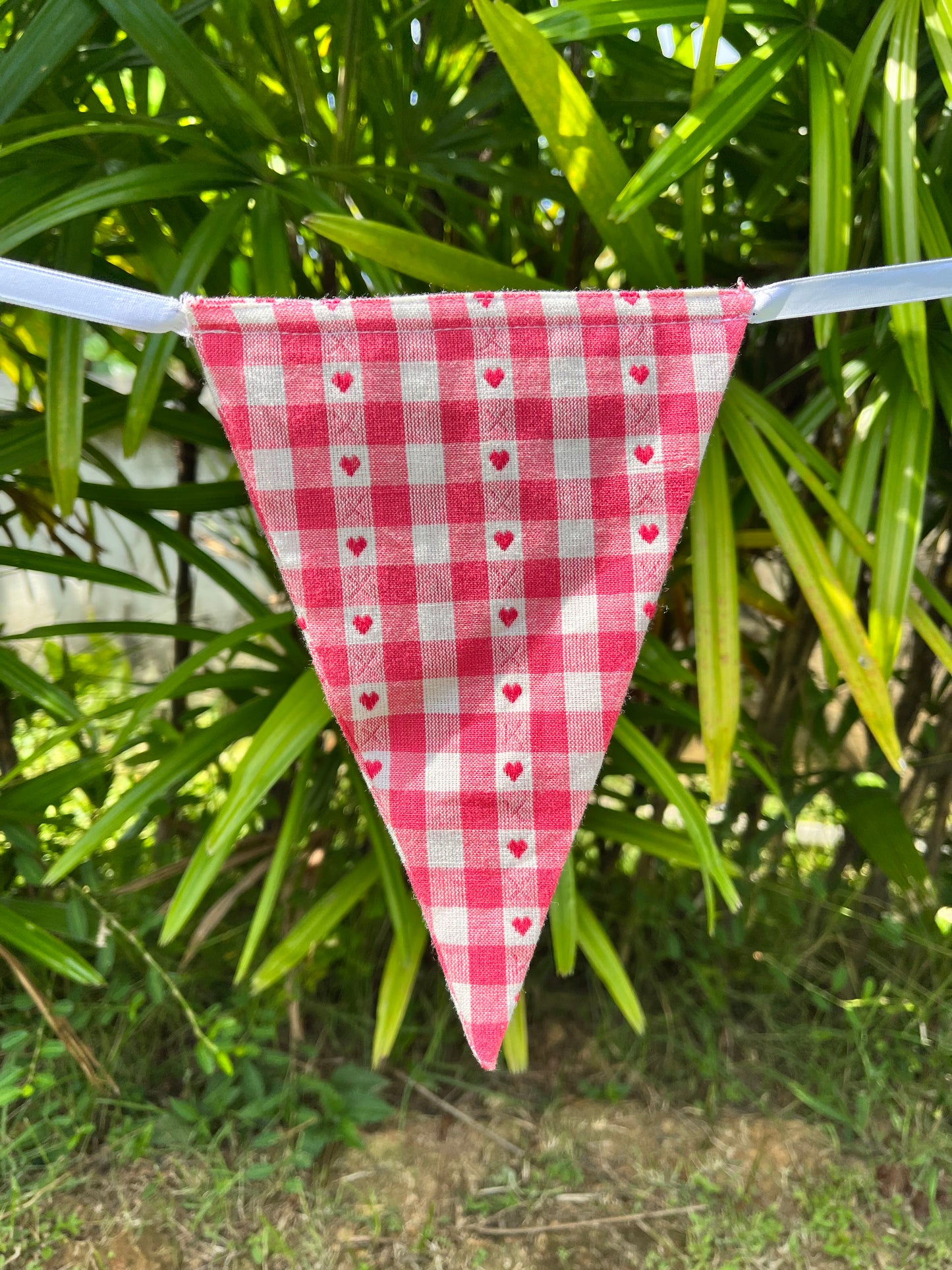 close up of red gingham bunting flag from sterck.
