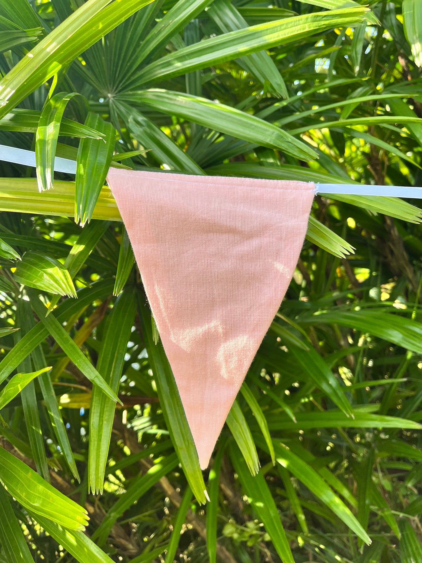 close up of pink bunting flag from sterck.