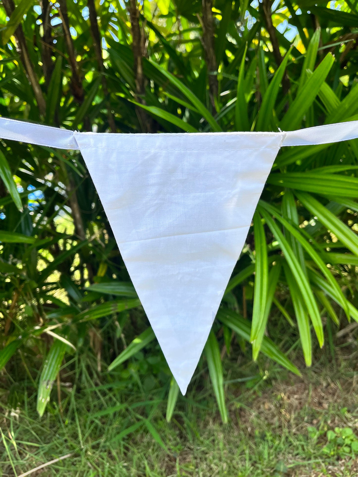 close up of white flag on balloo bunting from sterck.