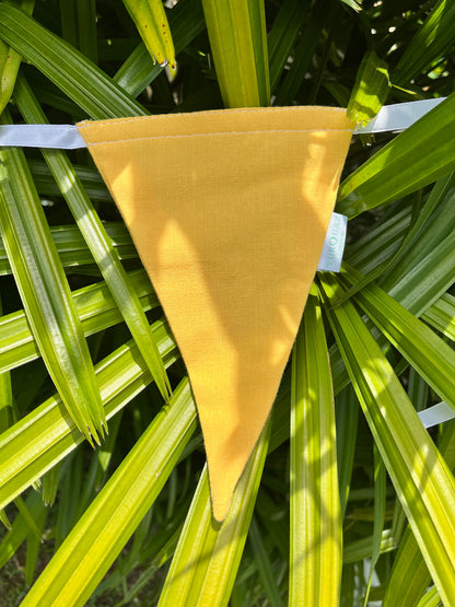Close up of yellow flag on Balloo bunting from Sterck.