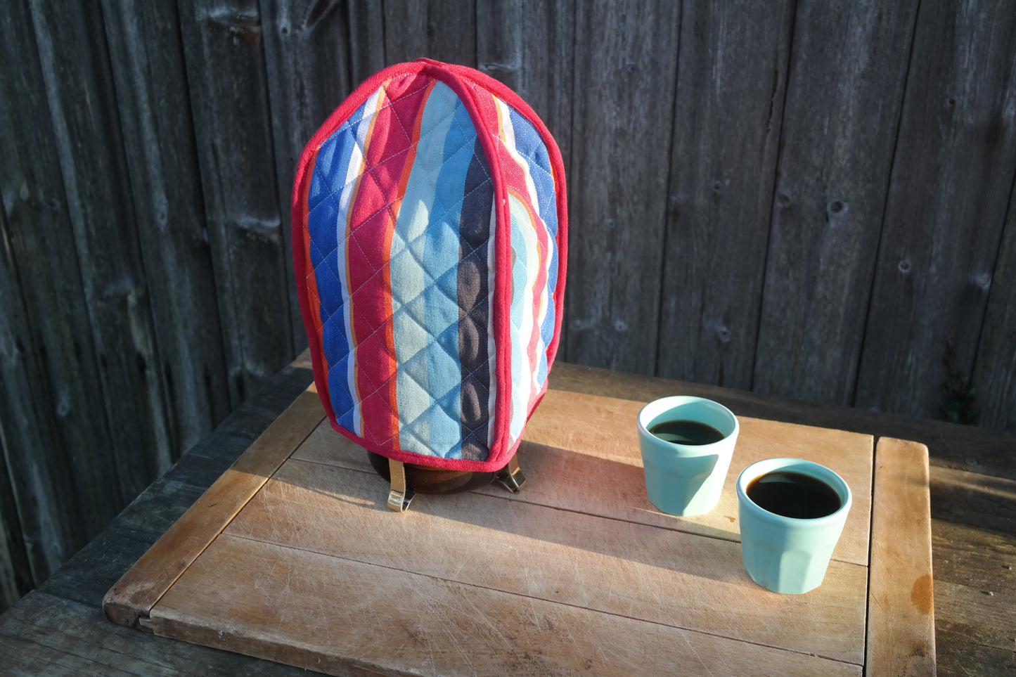 modern multicoloured striped cafetiere / french press cover / warmer. from sterck & co.