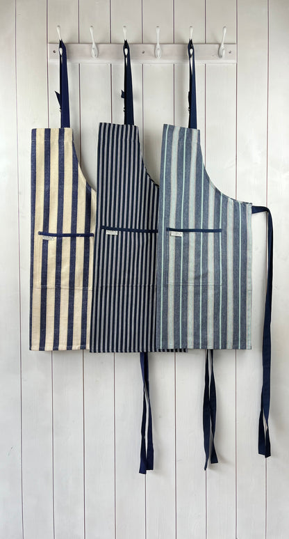 The classic collection. Classic striped cotton aprons from Sterck & Co.