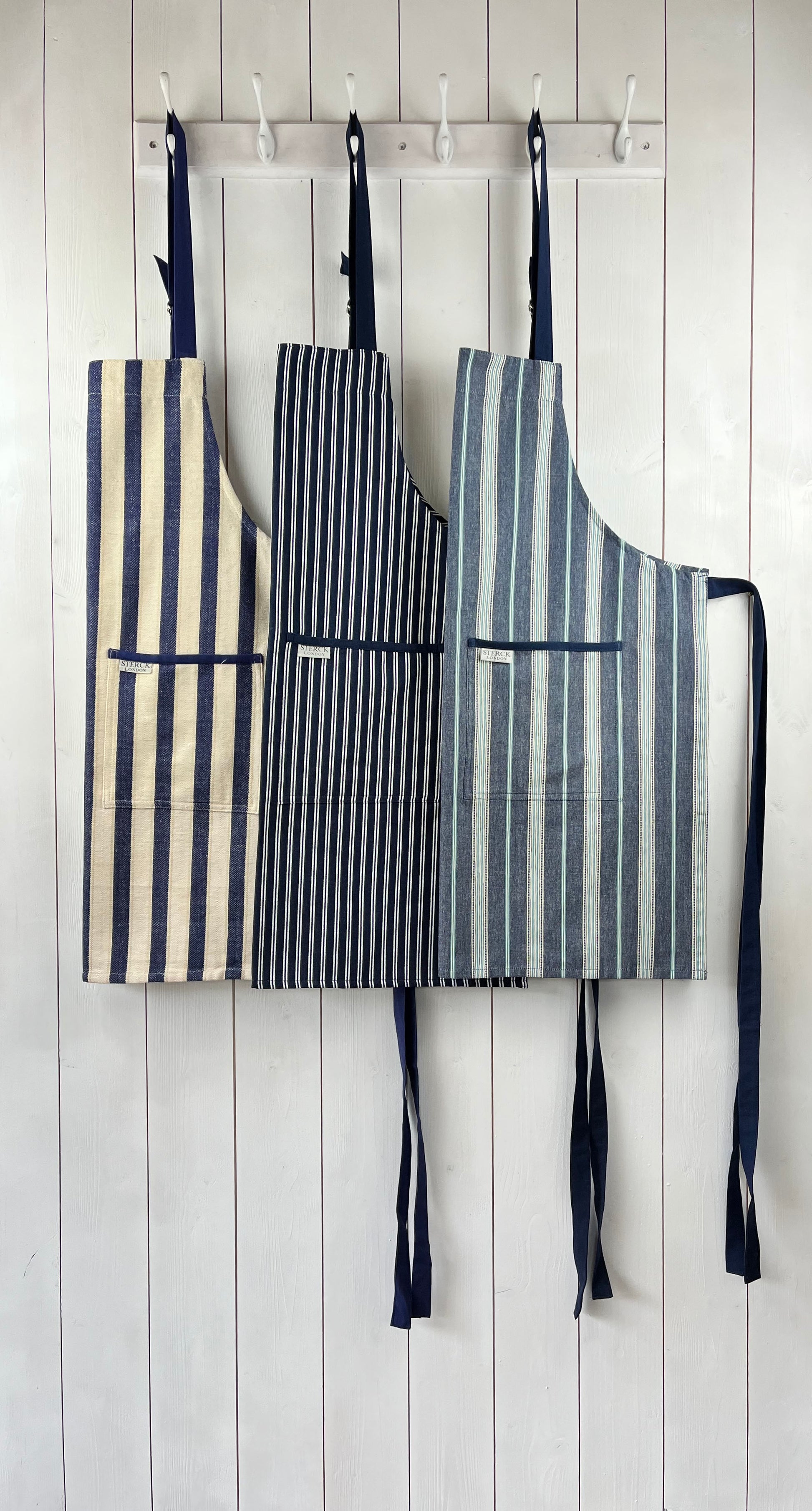 The Classic Collection of traditional striped cotton aprons from Sterck & Co.
