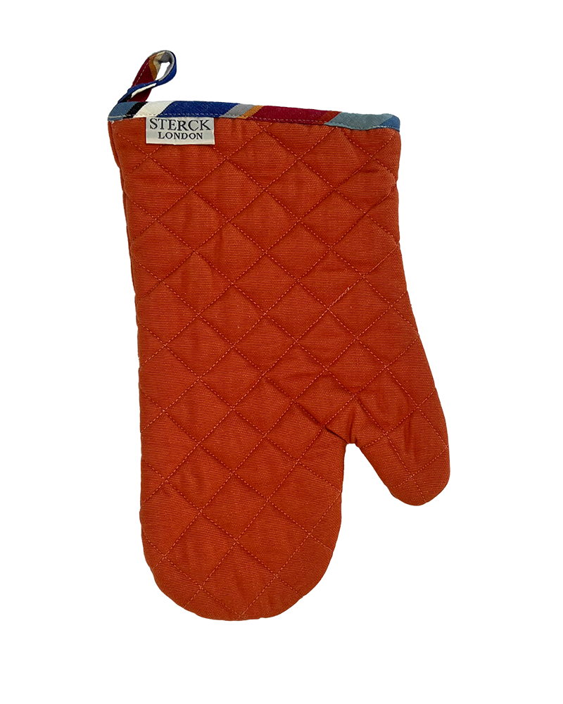 A colourful orange oven mitt with modern striped detailing at the cuff. from Sterck & Co.